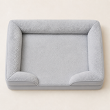 Gray raised-bolster dog bed viewed from above