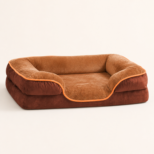 Brown raised-bolster dog bed on a warm ivory studio background